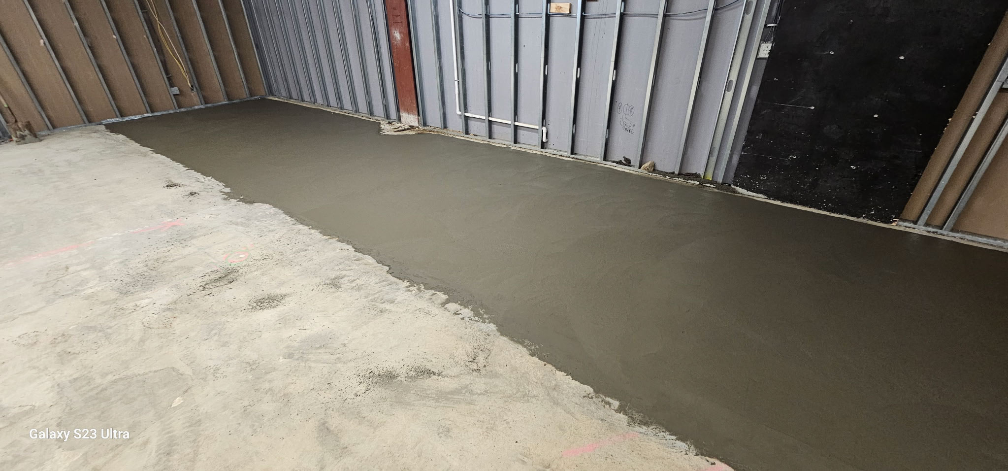 Basement floor concrete pour by Patriot Concrete