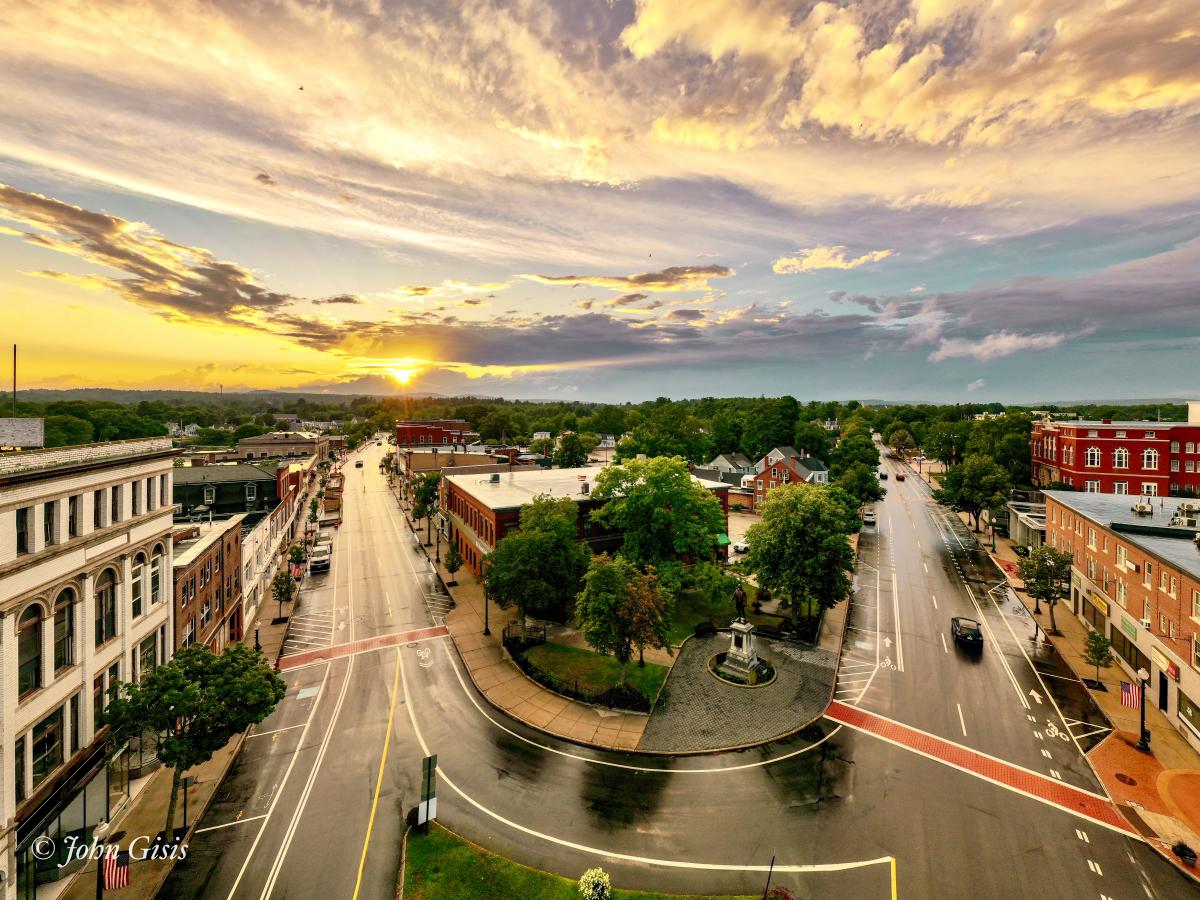 Downtown Rochester, NH at sunset — Service area for Patriot Concrete