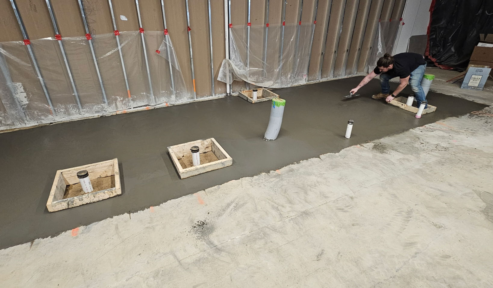Concrete garage slab pour by Patriot Concrete