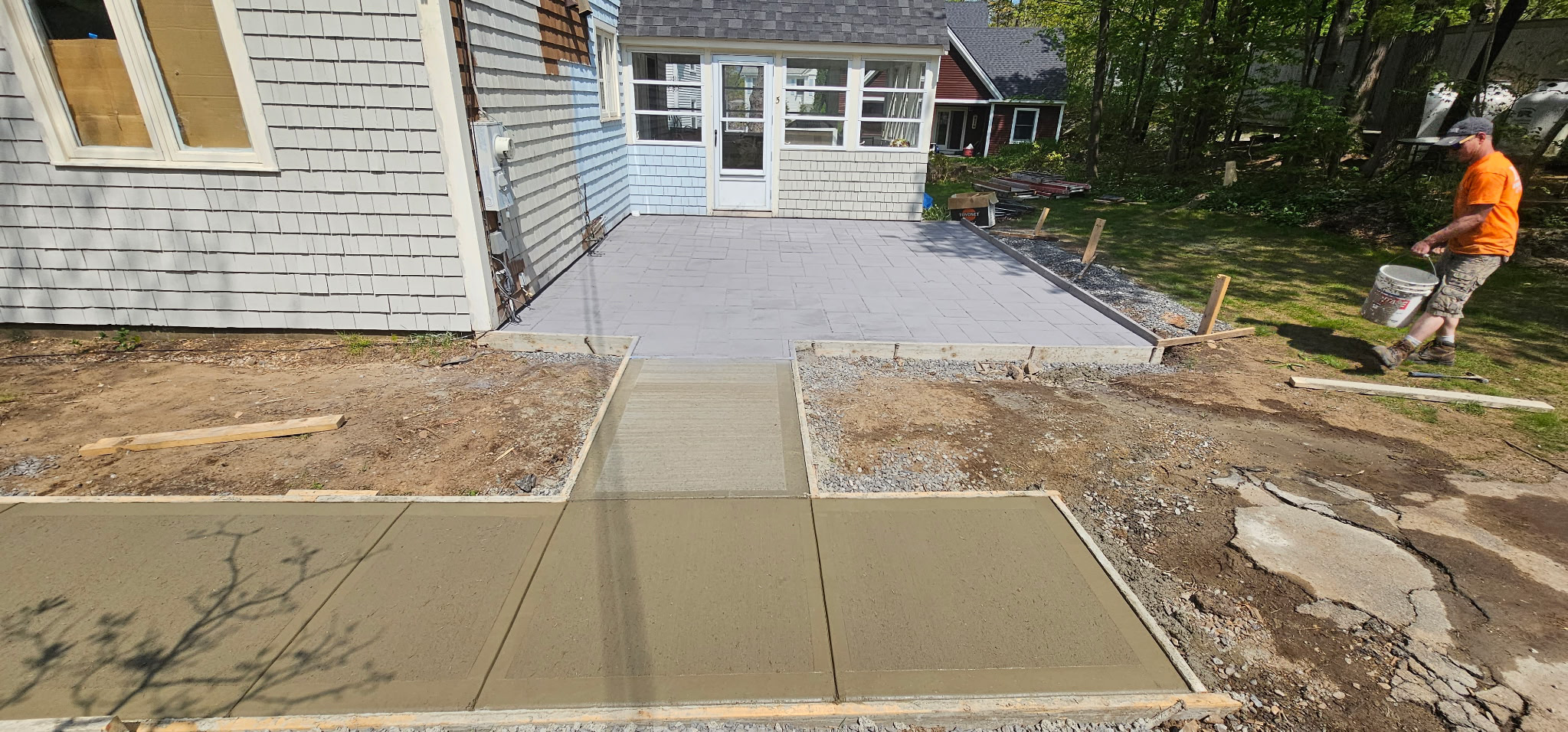 Concrete walkway and patio at residential home